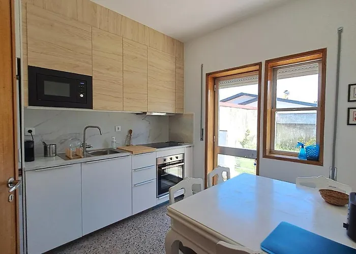 Cozy Com Jardim Hébergement de vacances Árvore