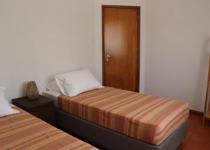 Cozy Com Jardim 펜션 Árvore